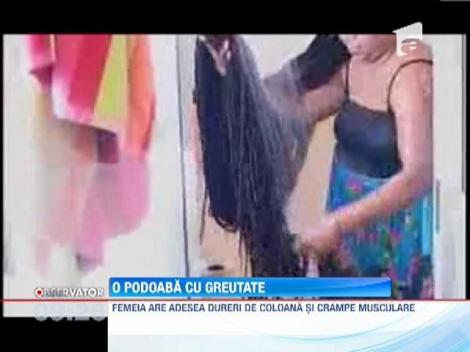 O femeie risca sa paralizeze, din cauza parului lung de 17 metri