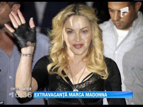 Madonna nu vrea sa renunte la aparatul dentar din aur
