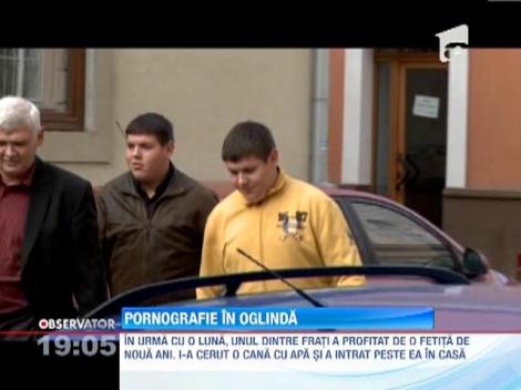 Doi fii de avocat, retinuti pentru pornografie infantila