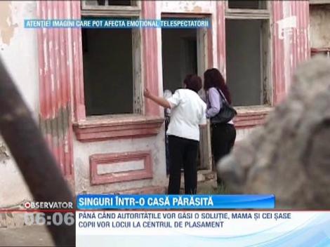 O casa parasita napadita de gunoaie a devenit adapost pentru o mama si cei sase copii ai sai