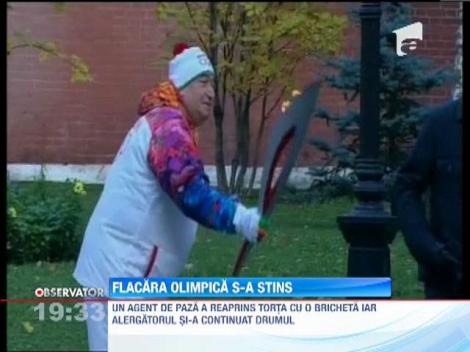 Flacara olimpica s-a stins chiar la finalul ceremoniei din Piata Rosie