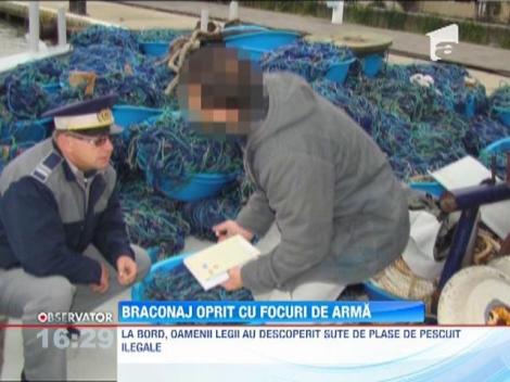 Braconaj oprit cu focuri de arma