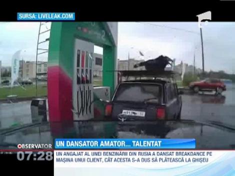 Sus pe... masina! In Rusia, spectacolul se face in benzinarie