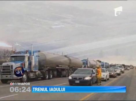 Un tren incarcat cu produse petroliere a luat foc in Canada, dupa ce a sarit de pe sine
