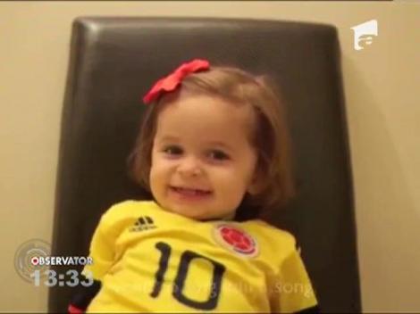 O fetita de 2 ani ii ureaza un "La multi ani!" adorabil tatalui ei