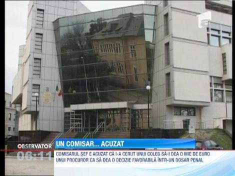 Comisar sef, retinut de colegi pentru trafic de influenta si tentativa de mituire