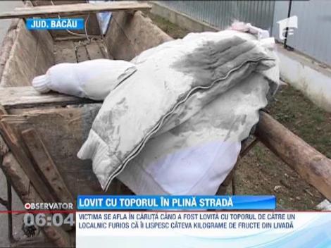 Lovit cu toporul în plină stradă