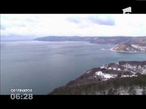 Flacăra Olimpică a poposit în cel mai adânc lac din lume, lacul Baikal