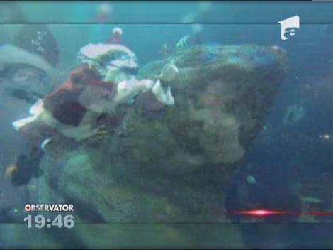 În Statele Unite, Moş Crăciun e subacvatic