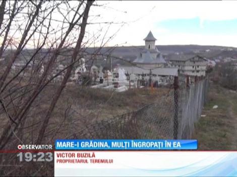 Iasi: Un bărbat acuză preotul paroh că a îngropat o femeie chiar la el pe hotar