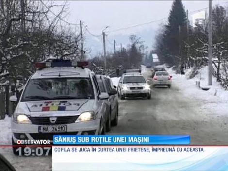 O fetiţă din Bistriţa Năsăud a alunecat cu sania sub roţile unei maşini.