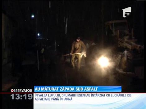 În Valea Lupului, drumarii ieșeni au întârziat cu lucrările de asfaltare până în iarnă