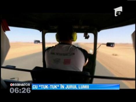 Doi tineri englezi au strabătut 42.000 de km. cu un triciclu motorizat