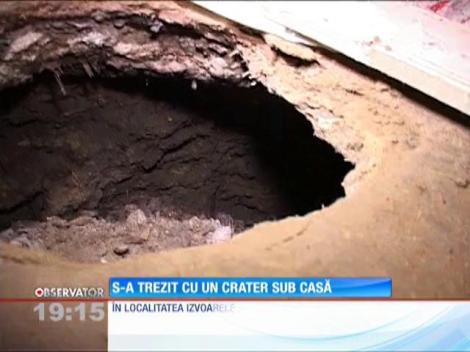 UPDATE / O localnică din Izvoarele s-a trezit cu groapa în casă