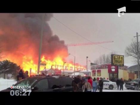 Canada: Mecanicul unei macarale, salvat dintr-un incendiu cu elicopterul