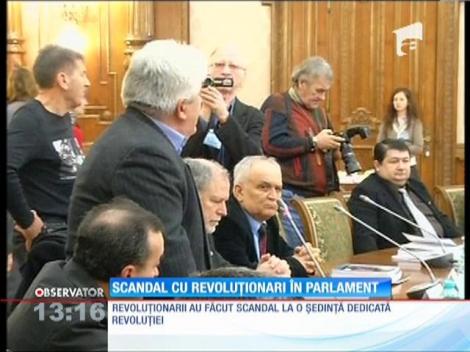 Scandal cu revoluţionari în Parlament