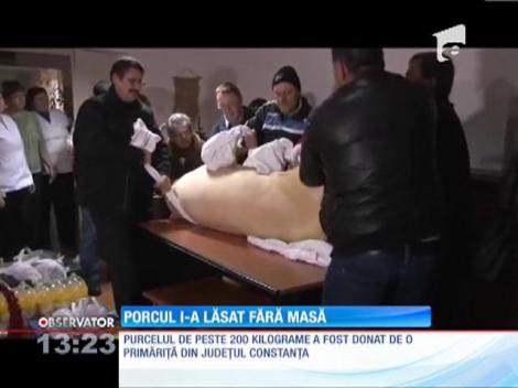 Porcul donat de Crăciun i-a lăsat fără masă