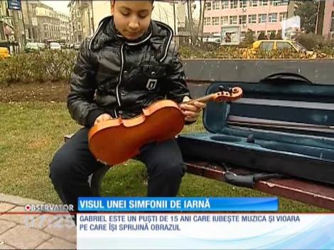 Visul unei simfonii de iarnă! Gabriel şi vioara s-au plăcut de mici