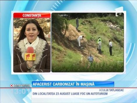 Afacerist carbonizat în maşină