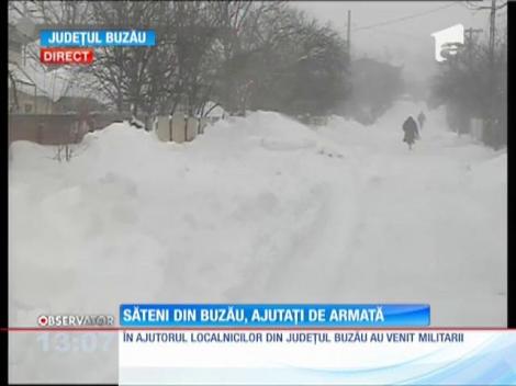 Sătenii din Buzău, ajutați de armată