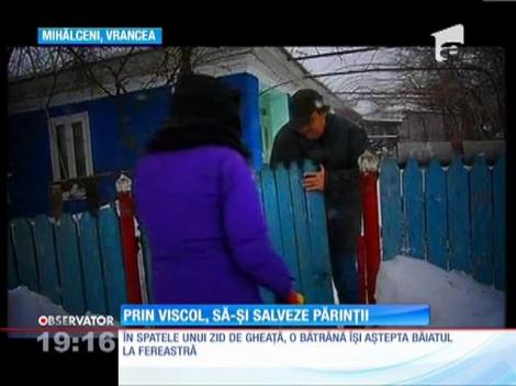 Prin viscol, sa-si salveze parintii!