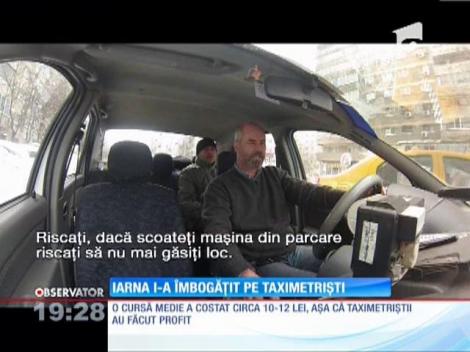 Iarna i-a îmbogăţit pe taximetristi