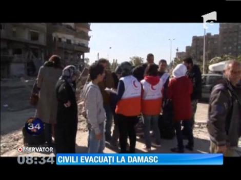 Civili evacuați la Damasc