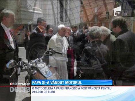 Motorul care poartă semnătura suveranului pontif pe rezervor a fost vândut la o licitaţie
