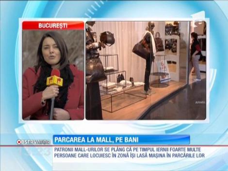 Parcarea la mall, pe bani