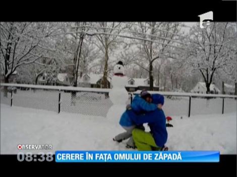 Cerere în căsătorie în fața omului de zăpadă