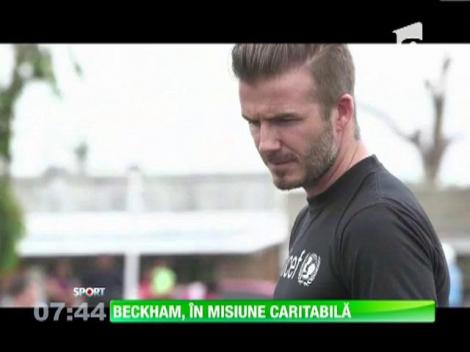Beckham i-a administrat un vaccin unei fetiţe din Filipine