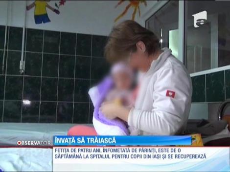 Fetiţa subnutrită din Vaslui face primii paşi spre recuperare
