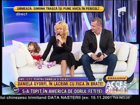 Daniela Gyorfi!, în lacrimi cu fiica în braţe!