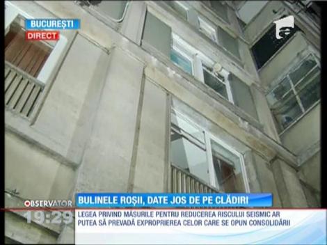 Parlamentarii iau în calcul exproprierea locatarilor care stau în cladiri cu bulină roșie