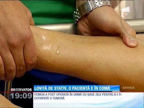 A intrat în comă după ce un stativ cu perfuzie i-a căzut peste faţă