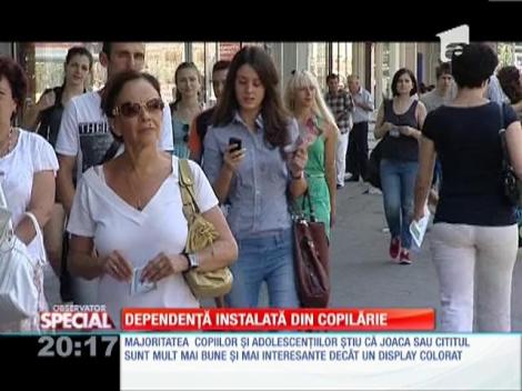 SPECIAL! Gadgeturile, dependență instalată din copilărie