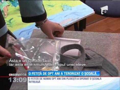 O fetiță de opt ani a terorizat o școală