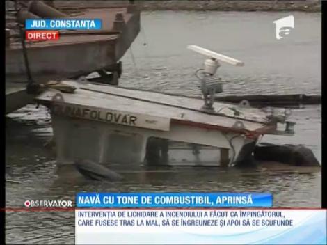 UPDATE / Un împingător care transporta 6 barje cu minereu de fier a luat foc pe Canalul Dunăre-Marea Neagră