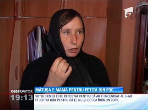 Fetiţa care s-a născut după ce mama ei ar fi fost incendiată va fi crescută de mătuşă