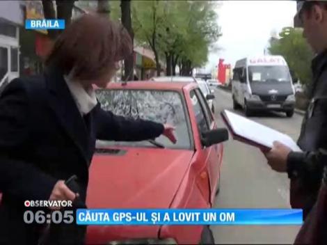 Atentă la GPS-ul căzut de pe bord, o femeie era să mutileze un om, pe o stradă din Brăila