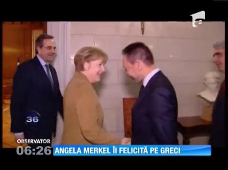 Angela Merkel a elogiat măsurile de austeritate din Grecia