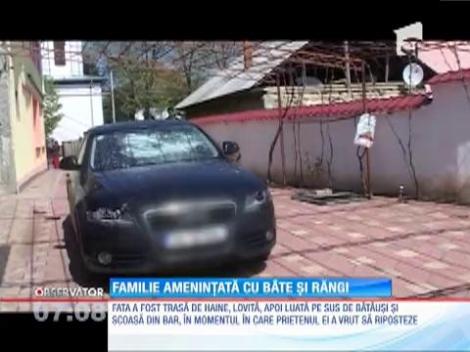 Familie amenințată cu bâte și răngi