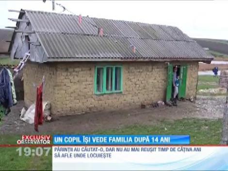 Un copil își vede familia după 14 ani
