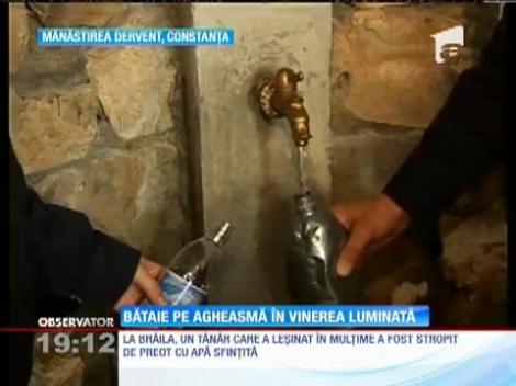 Bătaie pe agheasmă în Vinerea Mare