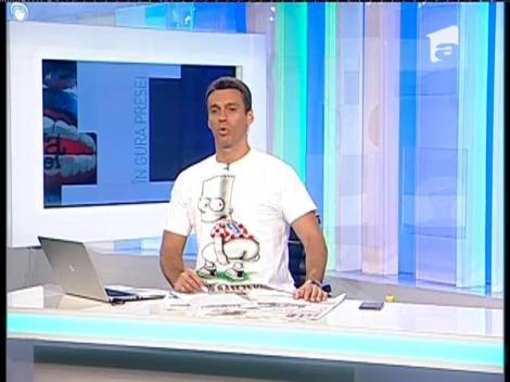 Mircea Badea, îmbrăcat într-un tricou cu mesajul "Jos Băsescu"