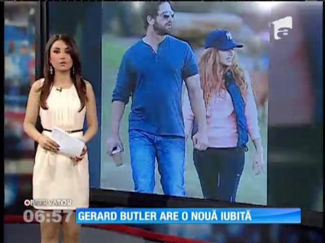 Gerard Butler, la braţul unei misterioase femei care seamănă remarcabil de bine cu Mădălina Ghenea