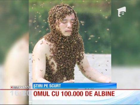 Cartea Recordurilor : Un barbat a stat acoperit de albine aproape 54 de minute si nu a fost inţepat