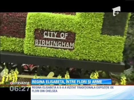 Regina Elisabeta, între flori şi arme