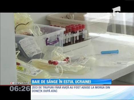 Baie de sânge în Ucraina! Aproape o sută de oameni ar fi fost ucişi în confruntările din jurul oraşului Doneţk