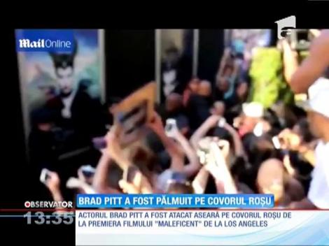 Brad Pitt, bătut pe covorul roşu!